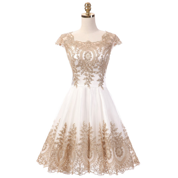 white dress with gold lace